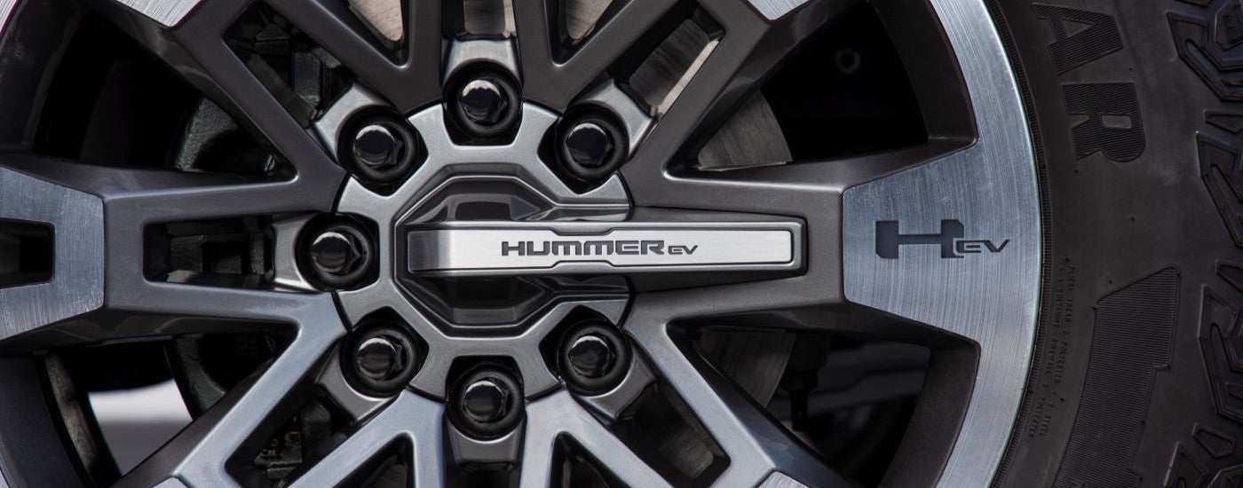 A close up shows the wheel on a 2024 GMC Hummer EV.